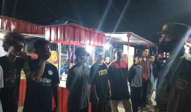 Kedapatan Tidak Pakai Masker, Disanksi Menyanyikan Lagu Indonesia Raya