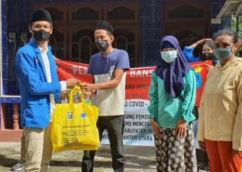 Gandeng PMII, Polda Kaltara Salurkan Bansos Kepada Warga Terdampak Covid-19 dan PPKM