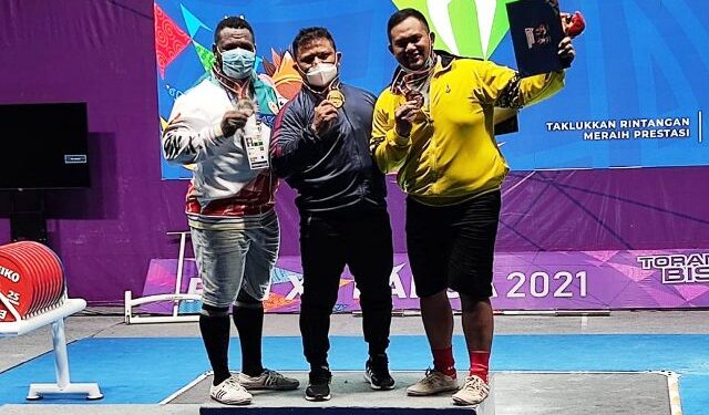 Tambah Medali Perunggu Melalui Lifter Hardi di Cabang Angkat Berat